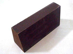 Fused magnesia brick